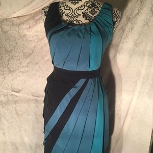 Black and blue pleated cocktail dress